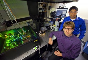 Jay Groves (foreground) and Pradeep Nair used TIRF imaging and their own spatial mutation strategy to discover a new way in which cells can sense and respond to physical forces.