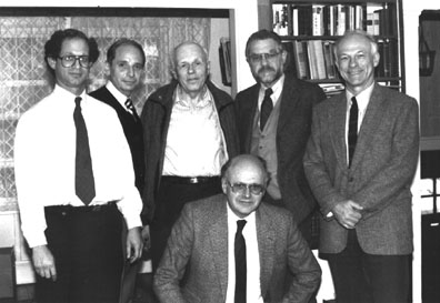 A group of SOS activists gathered in 1988 at the home of Andrei Sakharov's daughter in Newton, Massachusetts. From left, standing, are Robert Cahn and Morris Pripstein of Berkeley Lab, Andrei Sakharov, Philip Siegelman of San Francisco State University, and William Wenzel, also of Berkeley Lab. Kurt Gottfried of Cornell University is in front.