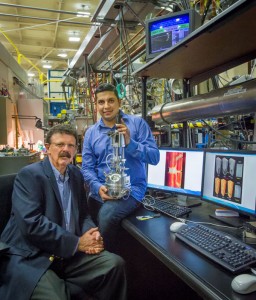 Robert Ritchie (left) and Hrishikesh Bale at ALS Beamline 8.3.2 with the mechanical testing rig they developed for in situ ultrahigh temperature X-ray computed microtomography. (Photo by Roy Kaltschmidt)