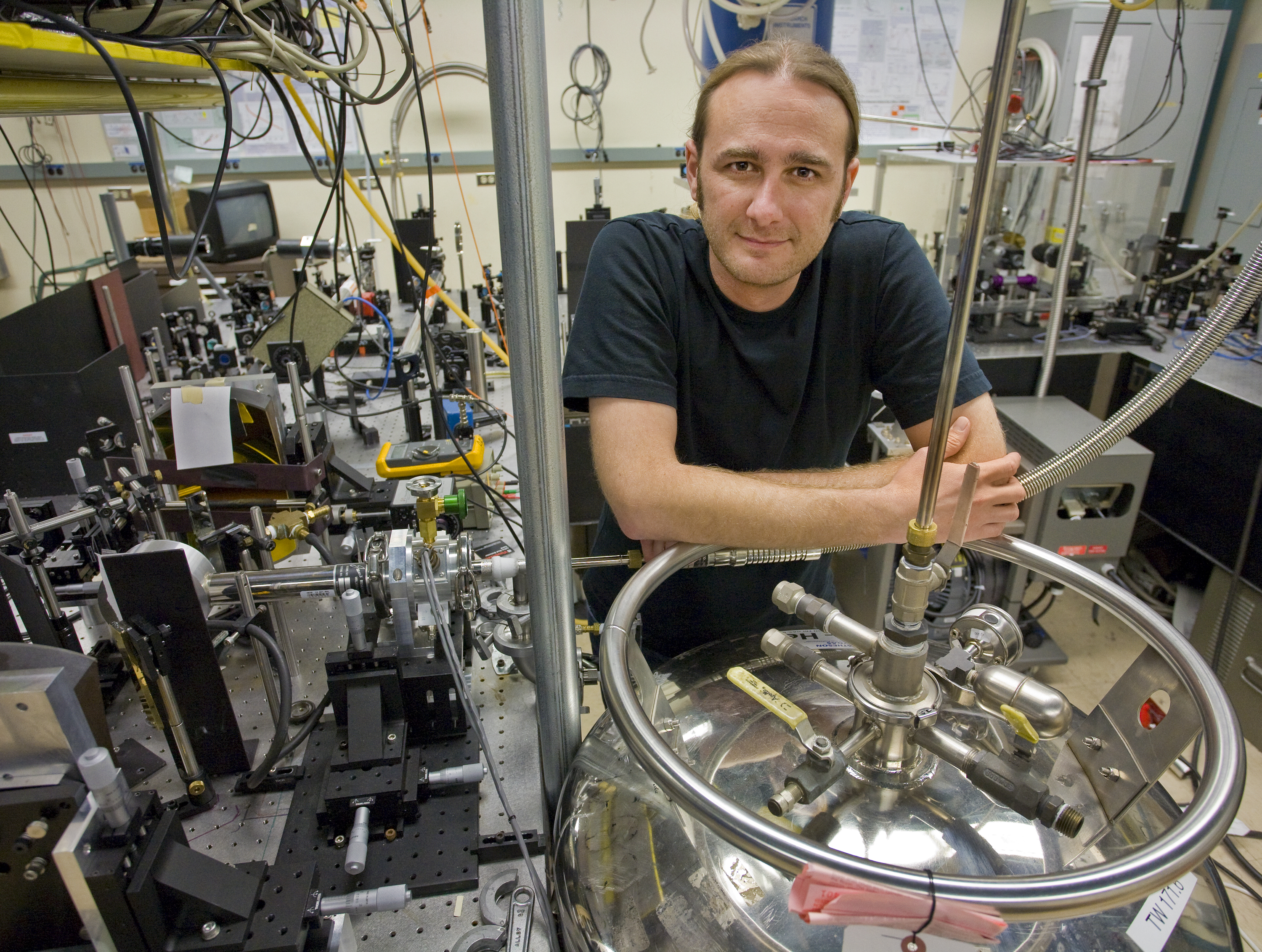 Jake Koralek with the laser interferometer in the Orenstein laboratory used to create persistent spin helices of electrons in semiconductor quantum wells. (Photo by Roy Kaltschmidt, Berkeley Lab Public Affairs) (Click on image for highest resolution.) 