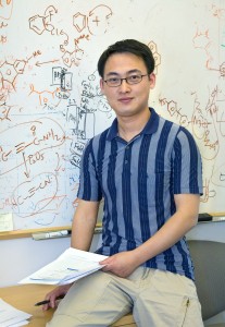 Berkeley Lab researcher Yi Liu at The Molecular Foundry created a caged structure made of ring molecules that assemble themselves around an axle-shaped molecule. The cage itself could hold ions or small biological molecules, making it potentially useful for sensing applications. 
