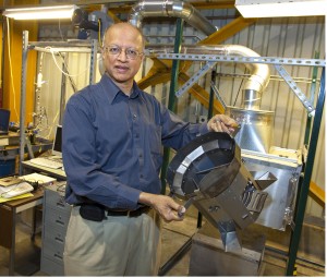 Heinz Award winning scientist Ashok Gadgil with the Darfur stove, a simple cookstove made of sheet metal or cast iron, designed to use less wood or alternative fuels such as animal dung.