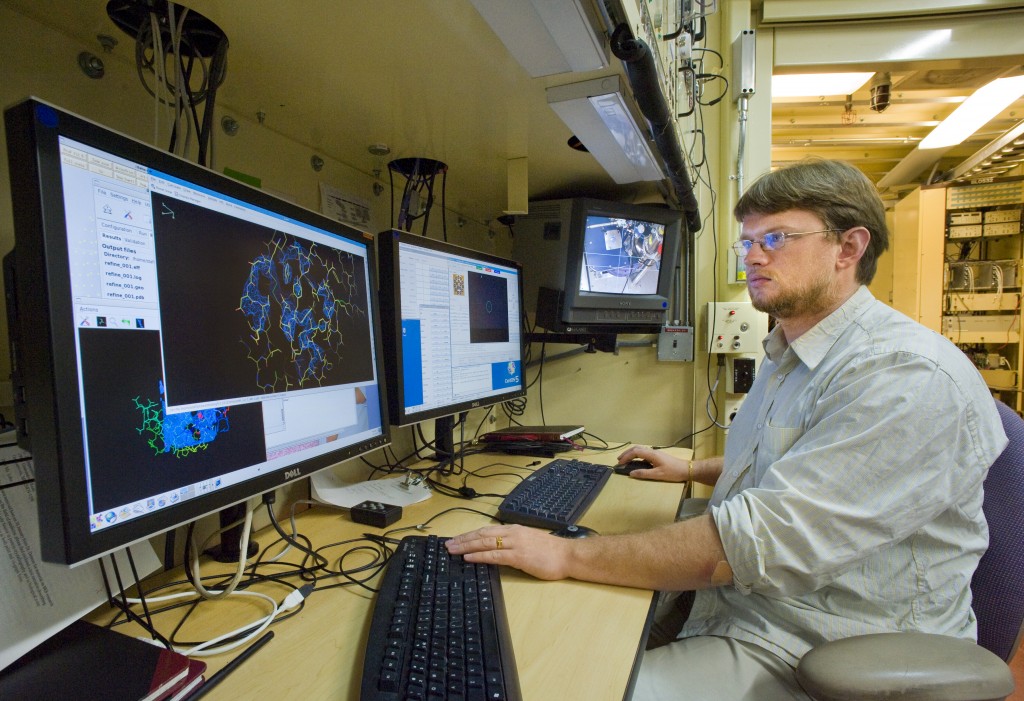 Keeping pace with genomics. Berkeley Lab's Peter Zwart at the Advanced Light Source's beamline 5.0.2, which is equipped to churn out atomic-scale resolution images of proteins.