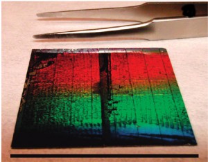 This photovoltaic cell is comprised of 36 individual arrays of silicon nanowires featuring radial p-n junctions. The color dispersion demonstrates the excellent periodicity present over the entire substrate. (Photo courtesy of Peidong Yang)