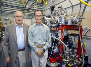 Gabor Somorjai (left), an authority on catalysis, and Miquel Salmeron, an authority on surface imaging, used a high-pressure Scanning Tunneling Microscope to observe the surface of a platinum catalyst under actual industrial reaction conditions. (Image by Roy Kaltschmidt, Berkeley Lab Public Affairs)