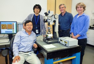 James DeYoreo, Carolyn Bertozzi, Seong-Ho Shin and Sungwook Chung with Berkeley Lab’s Molecular Foundry,  have used atomic force microscopy to study how bacterial surface-layer proteins form crystals in a cell-like environment. (Photo by Roy Kaltschmidt, Berkeley Lab Public Affairs). 
