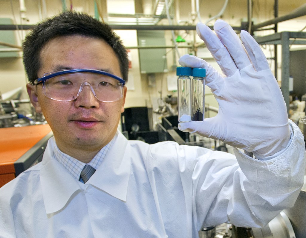 Berkeley Lab scientist Samuel Mao leads a research team that is searching for sustainable ways to generate hydrogen for use in clean-energy technologies. In a first-of-its-kind development, they jumbled the surface layer of titanium dioxide nanocrystals, a feat that turned the material from white to black. It also created a photocatalyst whose efficiency outpaces others in using the sun’s energy to extract hydrogen from water. (Photo by Roy Kaltschmidt, Berkeley Lab Public Affairs)