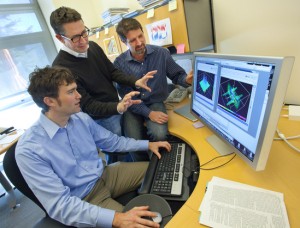 Berkeley Lab scientists Jim Schuck, Jeff Neaton and Stefano Cabrini discuss visualizing plasmonic fields. (Photo by Roy Kaltschmidt, Berkeley Lab Public Affairs)