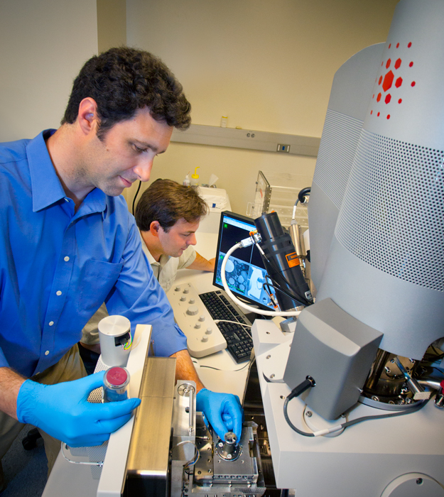Berkeley Lab scientist Andy Minor (left) and Peter Hosemann have devised a nanoscale testing technique for irradiated materials to provide macroscale materials-strength properties. This technique could help accelerate the development of new materials for nuclear applications, while reducing the amount of material required for testing facilities already in service. 