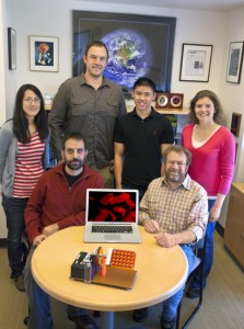 Developers of the SheetRocker, a programmable vial rocking device to enable the self assembly of 2D nanomaterials included  (Back, L to R) ) Marika Harada, Romas Kudirka, Andrew Cho, Gloria Olivier; (Front, L to R) Babak Sanii and Ron Zuckermann.  (Photo by Roy Kaltschmidt, Berkeley Lab)