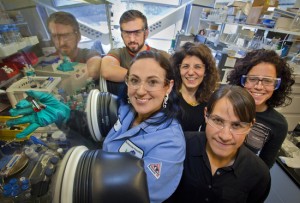 From left, Brett Helms, Evelyn Rosen, Raffaella Buonsanti, Delia Milliron and Anna Llordes at Berkeley Lab’s Molecular Foundry with vials of bare surface nanocrystals. (Photo by Roy Kaltschmidt, Berkeley Lab)