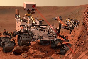 Artist’s concept of Rover Curiosity with LIBS technology firing a beam of infrared light at Martian rock for spectroscopic analysis. (Image courtesy of NASA)