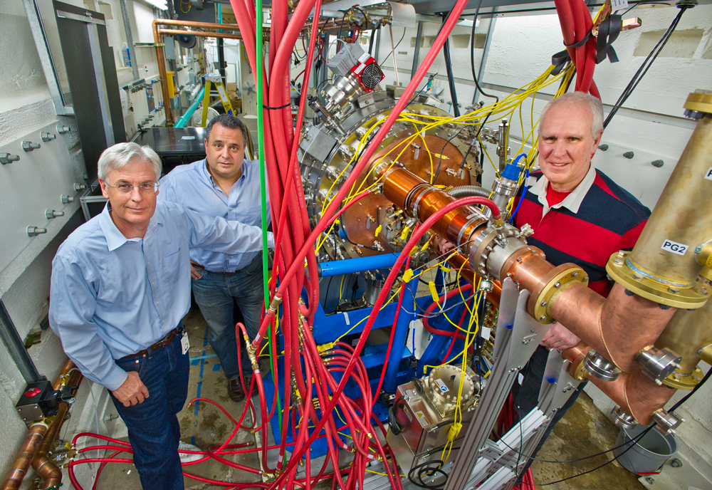 From right, John Staples and Fernando Sannibale of the Accelerator and Fusion Research Division conceived APEX, and Russell Wells (left) of Engineering led its construction. (Lawrence Berkeley National Laboratory photo by Roy Kaltschmidt) 