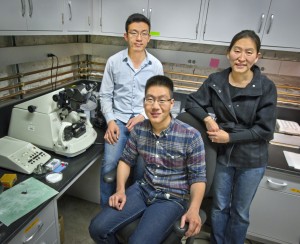 From left Peter Bai, Joseph Kao and Ting Xu incorporated gold nanoparticles into solutions of block co-polymer supramolecules to form multiple-layers of self-assembled thin films. (Photo by Roy Kaltschmidt, Berkeley Lab)