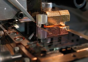 Dan Stamper-Kurn’s research group has developed a microfabricated atom-chip system which provides a magnetic trap for capturing a gas made up of thousands of ultracold atoms. (Photo courtesy of Stamper-Kurn group)