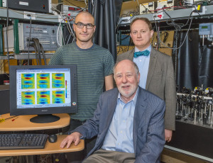 From left, Nicholas Lewis, Graham Fleming and Tom Oliver developed 2D-EV, a spectroscopy technique that enables electronic and molecular dynamics during a photochemical reaction to be simultaneously monitored on a femtosecond time-scale. (Photo by Roy Kaltschmidt)