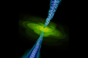 A computer simulation of gas (in yellow) falling into a black hole (too small to be seen). Twin jets are also shown with magnetic field lines. Image credit: Alexander Tchekhovskoy, LBL