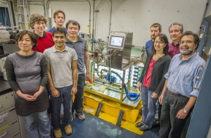 Junko Yano (far left) and Vittal Yachandra (far right) are leading a team of Berkeley Lab researchers in an international collaboration to unlock the secrets behind photosystem II’s ability to split water molecules. (Photo by Roy Kaltschmidt)