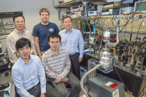 (Clockwise from lower left) Ziliang Ye, Xiang Zhang, Kevin O'Brien, Steven Louie and Ting Cao discovered excitonic dark states in monolayers of a 2D TMDC material that hold important implications for future nanoelectronic and photonic applications. (Photo by Roy Kaltschmidt) 