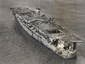 Aerial view of ex-USS Independence at anchor in San Francisco Bay, California, January 1951. There is visible damage from the atomic bomb tests at Bikini Atoll. Credit: San Francisco Maritime National Historical Park, P82-019a.3090pl_SAFR 19106