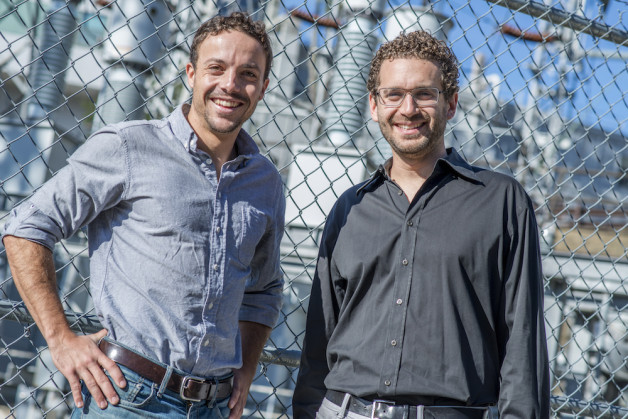 Sebastien Lounis (left) and Ilan Gur head up Cyclotron Road. (Photo credit: Berkeley Lab)