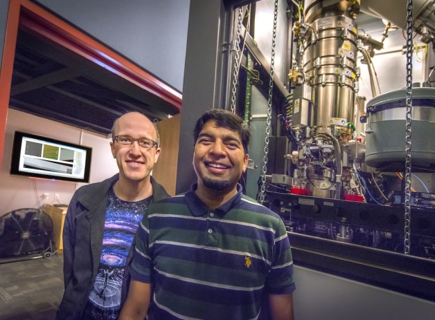 Colin Ophus (left) and Alpesh Khushalchand Shukla in front of the TEAM 0.5 microscope at the Molecular Foundry.