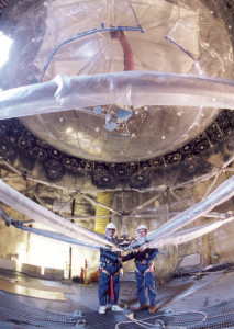 Berkeley Lab’s Kevin Lesko and Milt Moebus in 1997 at the installation of SNO more than a mile underground in a nickel mine outside of Ontario, Canada. (Photo by Roy Kaltschmidt)
