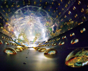 Eight detectors like this one, filled with liquid scintillator and surrounded by photomultiplier tubes, were deployed under the mountains near the six immensely powerful nuclear reactors at Daya Bay. Berkeley scientists and engineers designed the experiment’s key components. (Photo Roy Kaltschmidt
