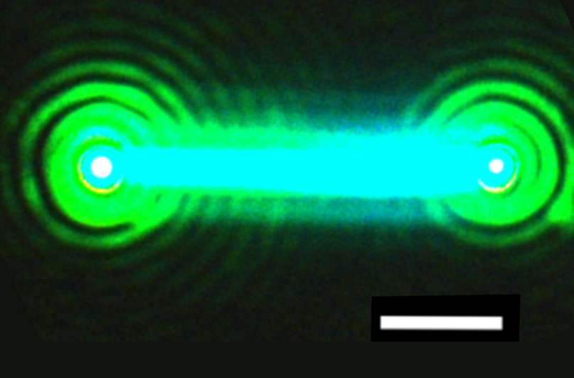 Image showing a nanolaser emitting bright light.