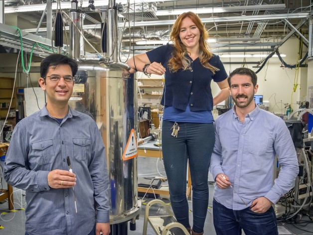 From left, Chris Vassiliou, Ashley Truxal and Clancy Slack with an NMR magnet in Alex Pines' UC Berkeley lab. They built a device that allows a new class of materials to be analyzed by NMR. (Credit: Berkeley Lab)