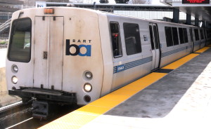 Photo - A Bay Area Regional Transit (BART) train pulls into a station. In March, Dozens of BART cars were temporarily put out of service when an electrical surge caused the failure of devices called “thyristors.” Thyristors have a wide range of applications, and have been used for decades in particle accelerators at Berkeley Lab. (Credit: Flickr/Eric Fischer via Creative Commons) 