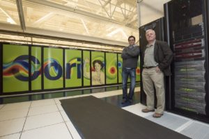 David Trebotich (left) and Carl Steefel, leaders of the exascale subsurface modeling project, pose with Cori, NERSC's newest supercomputer. Photo by Marilyn Chung.