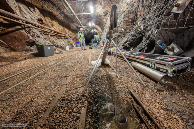 Berkeley Lab researchers have deployed various tools to collect data on the boreholes they drilled at kISMET, a rock observatory a mile underground at the Sanford Underground Research Facility in South Dakota. (Credit: Matthew Kapust, Sanford Underground Research Facility)