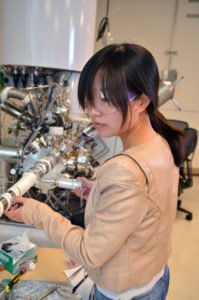 Jinhui Yang performing X-ray photoelectron spectroscopy measurements, which are used to understand the chemical properties of surfaces, at the Joint Center for Artificial Photosynthesis. (Credit: Robert Paz/Caltech) 