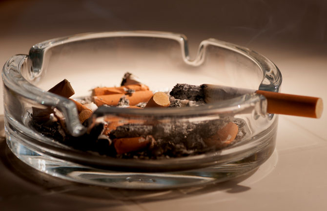 photo of cigarette butts on ashtray