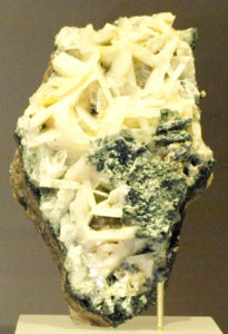 Photo - Naturally formed crystals of the mineral whitlockite, which is rare on Earth, are visible in this sample on display at Canada's Royal Ontario Museum. (Credit: Wikimedia Commons)