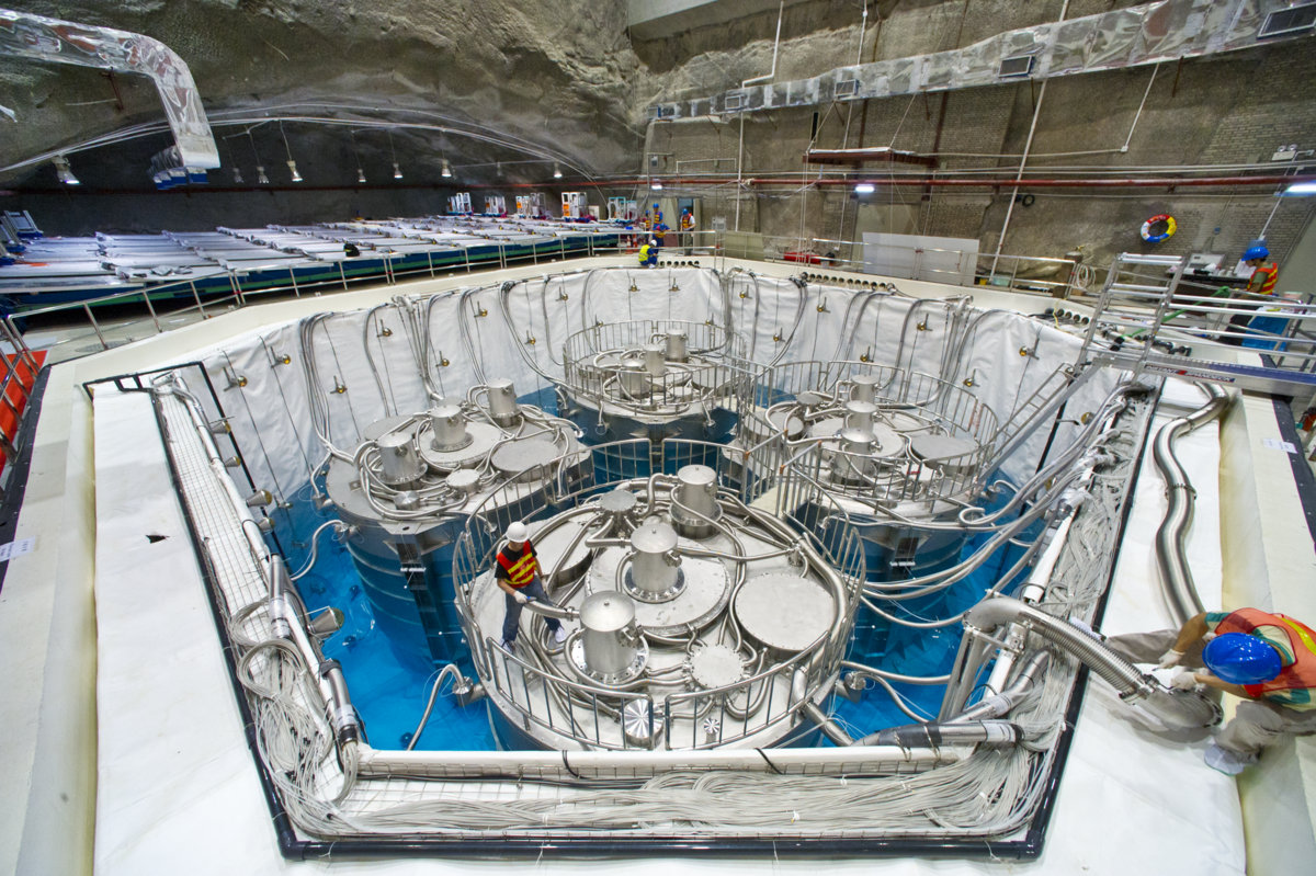 Photo - Antineutrino detectors at the Daya Bay experiment in Guangdong, China, as seen during final construction in August 2012. (Credit: Roy Kaltschmidt/Berkeley Lab)