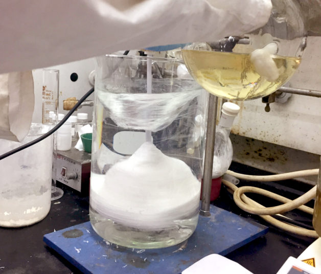 Photo - A laboratory demonstration of bulk synthesis of a polysulfate, which relied on a chemical technique dubbed a SuFEx reaction. (Credit: Berkeley Lab)