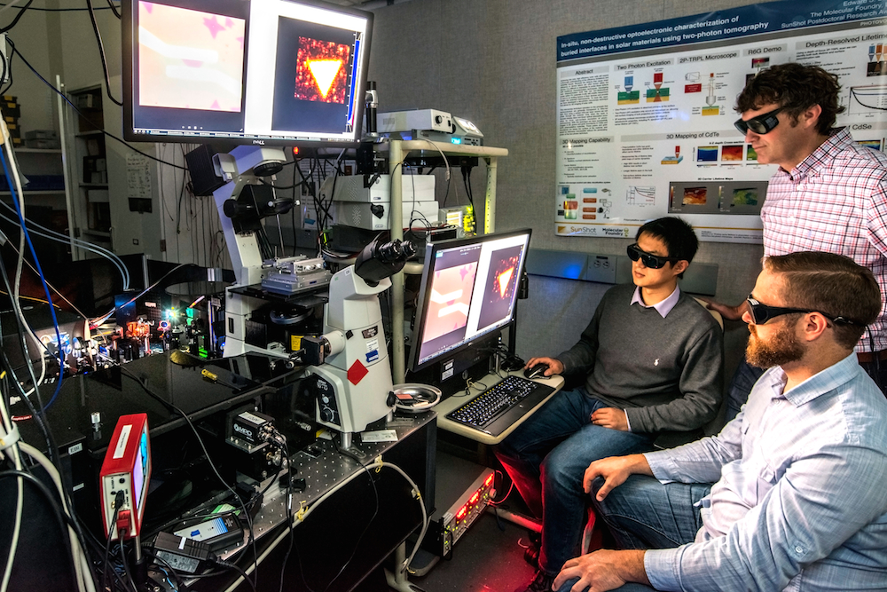 Image - Kaiyuan Yao (seated at left), Nick Borys (seated at right), and P. James Schuck (standing), seen here at Berkeley Lab’s Molecular Foundry, measured a property in a 2-D material that will could help realize new applications. (Credit: Marilyn Chung/Berkeley Lab)