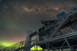 Photo - The IceCube Lab and the Milky Way, with an aurora on the horizon, are visible in this May 2017 photo. (Credit: IceCube Collaboration)