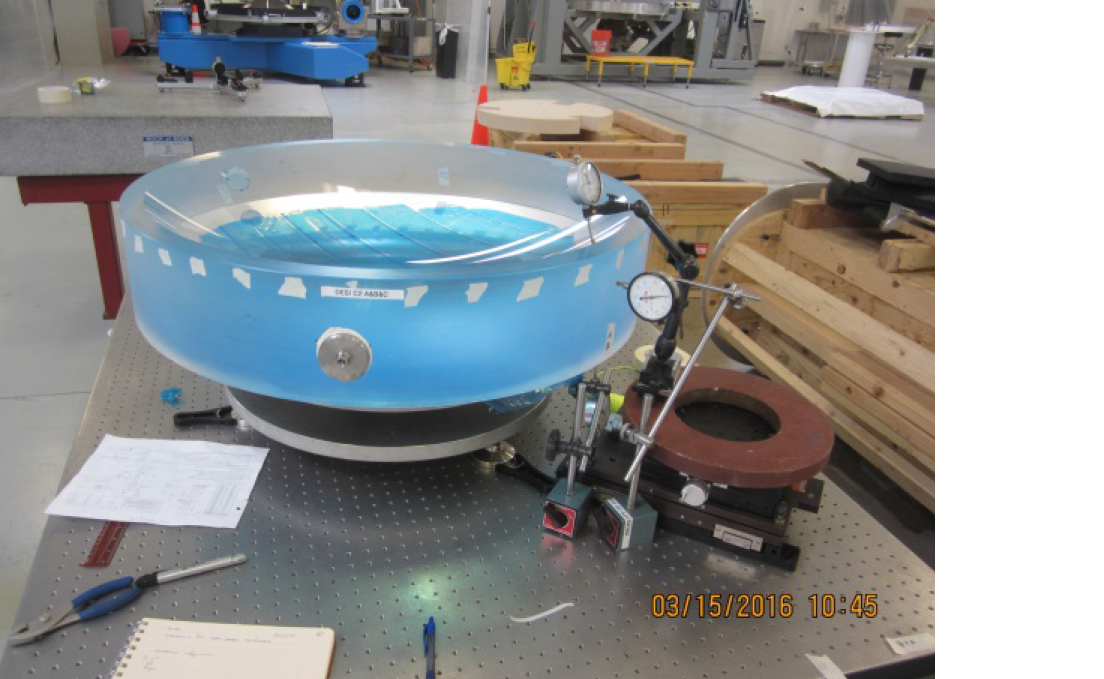 Photo - The lens is mounted on an inspection table to undergo final measurements, Arizona Optical Systems (AOS) in Tucson, Arizona.