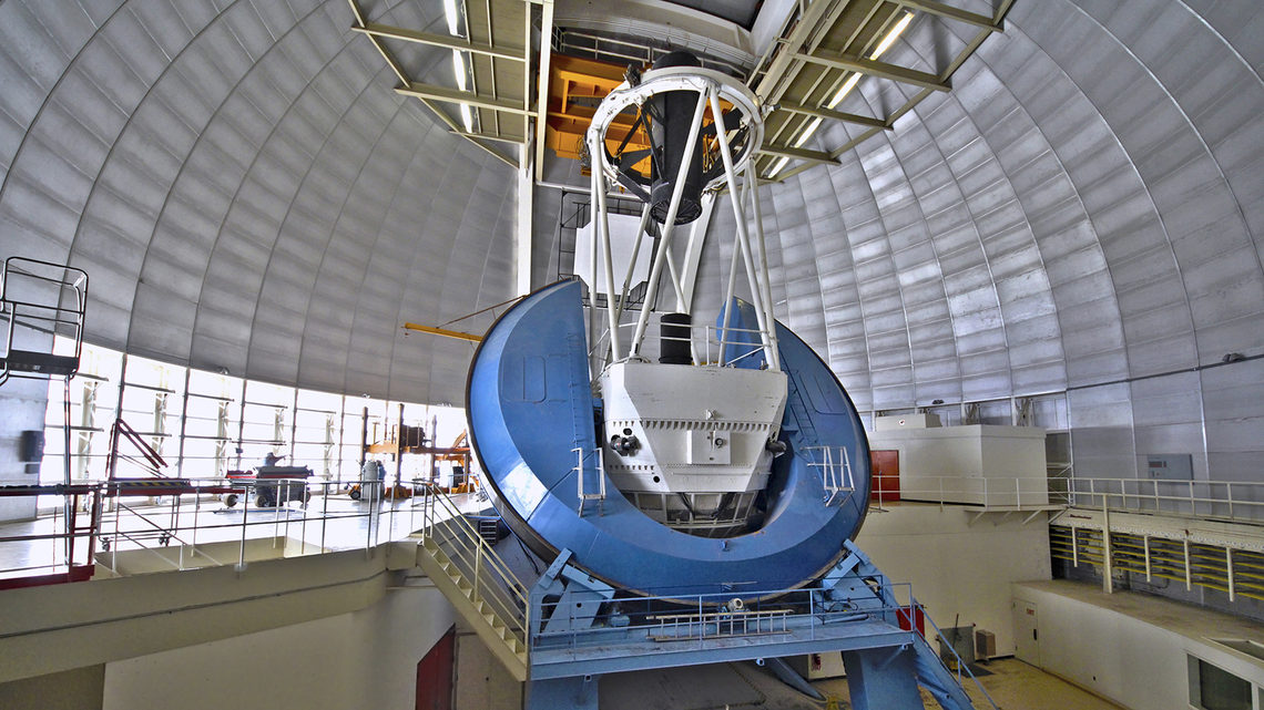 Photo - A view inside the dome at the Mayall Telescope in Arizona. The telescope’s 2-meter corrector barrel will be removed and replaced with a new corrector barrel for the Dark Energy Spectroscopic Instrument. DESI’s installation will begin soon at the telescope.