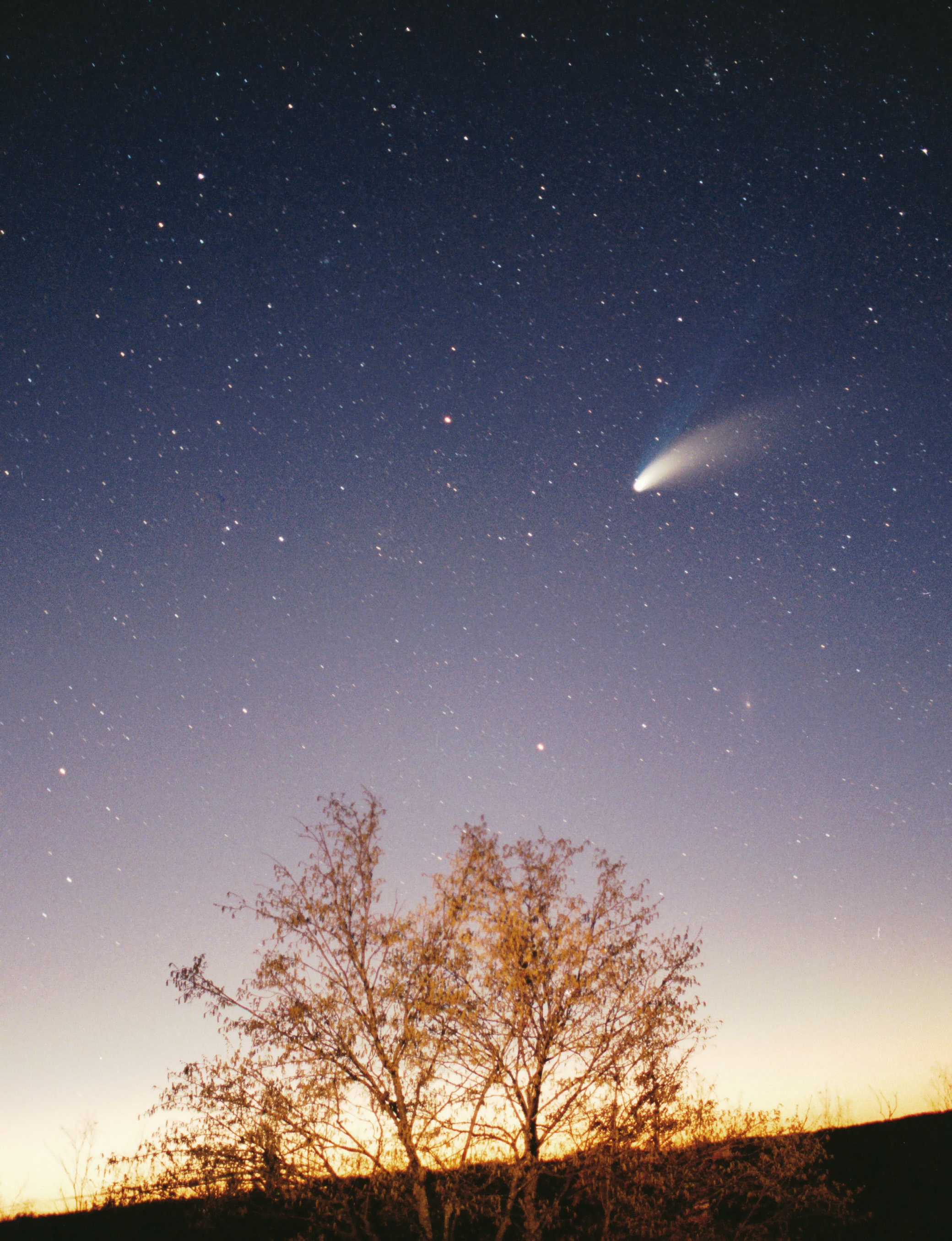 Photo - As comets, like Hale Bopp shown here, pass near the Sun, they release dust that can reach Earth's orbit and settle through the atmosphere where it can be collected. (Credit: Philipp Salzgeber/CC license)