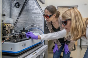Berkeley Lab researchers Francesca Toma (left) and Johanna Eichhorn used a photoconductive atomic force microscope to better understand materials for artificial photosynthesis. 