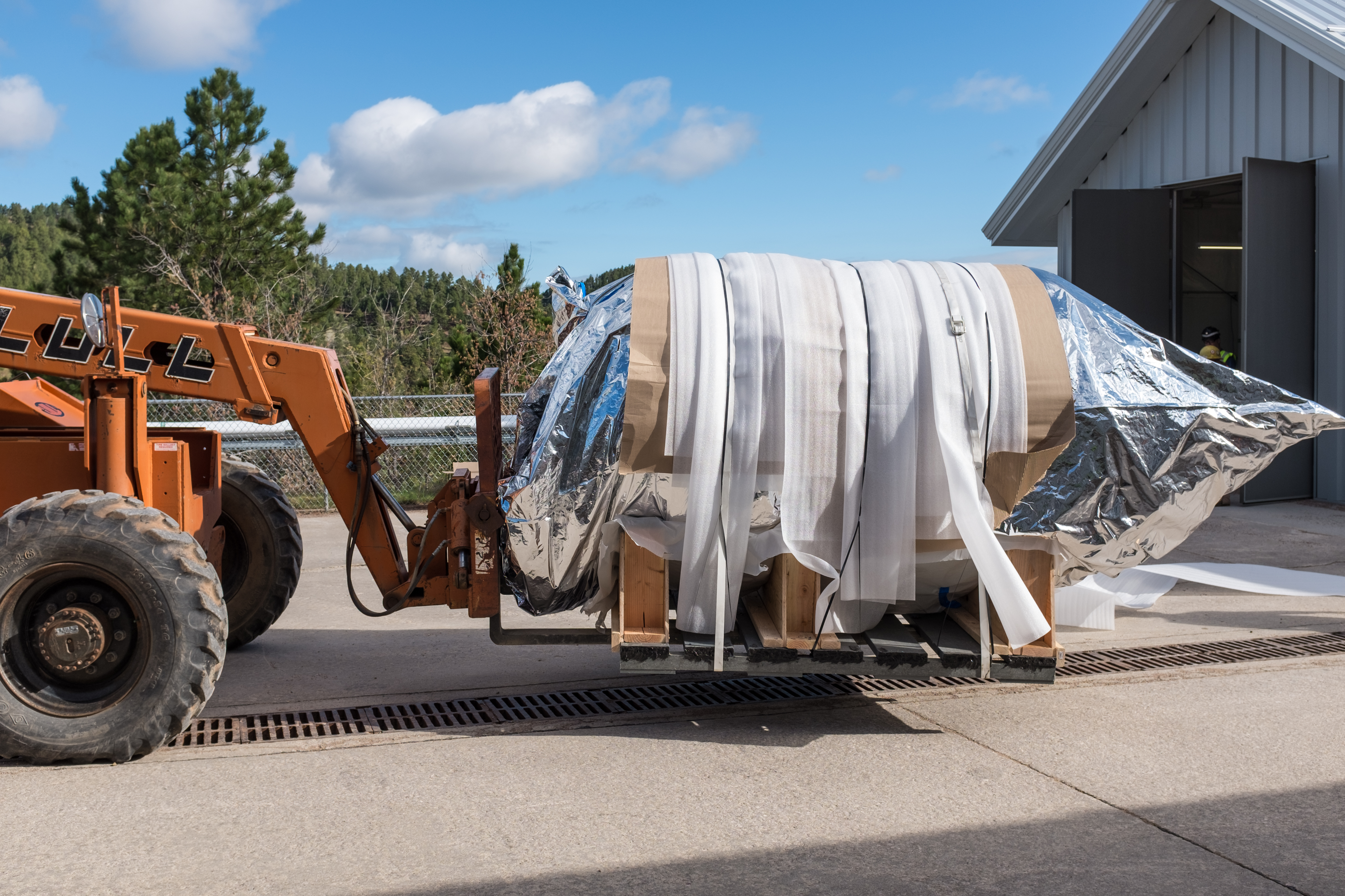 Photo - The inner cryostat vessel is off-loaded from a truck at the Sanford Underground Research Facility in South Dakota. (Credit: STFC)