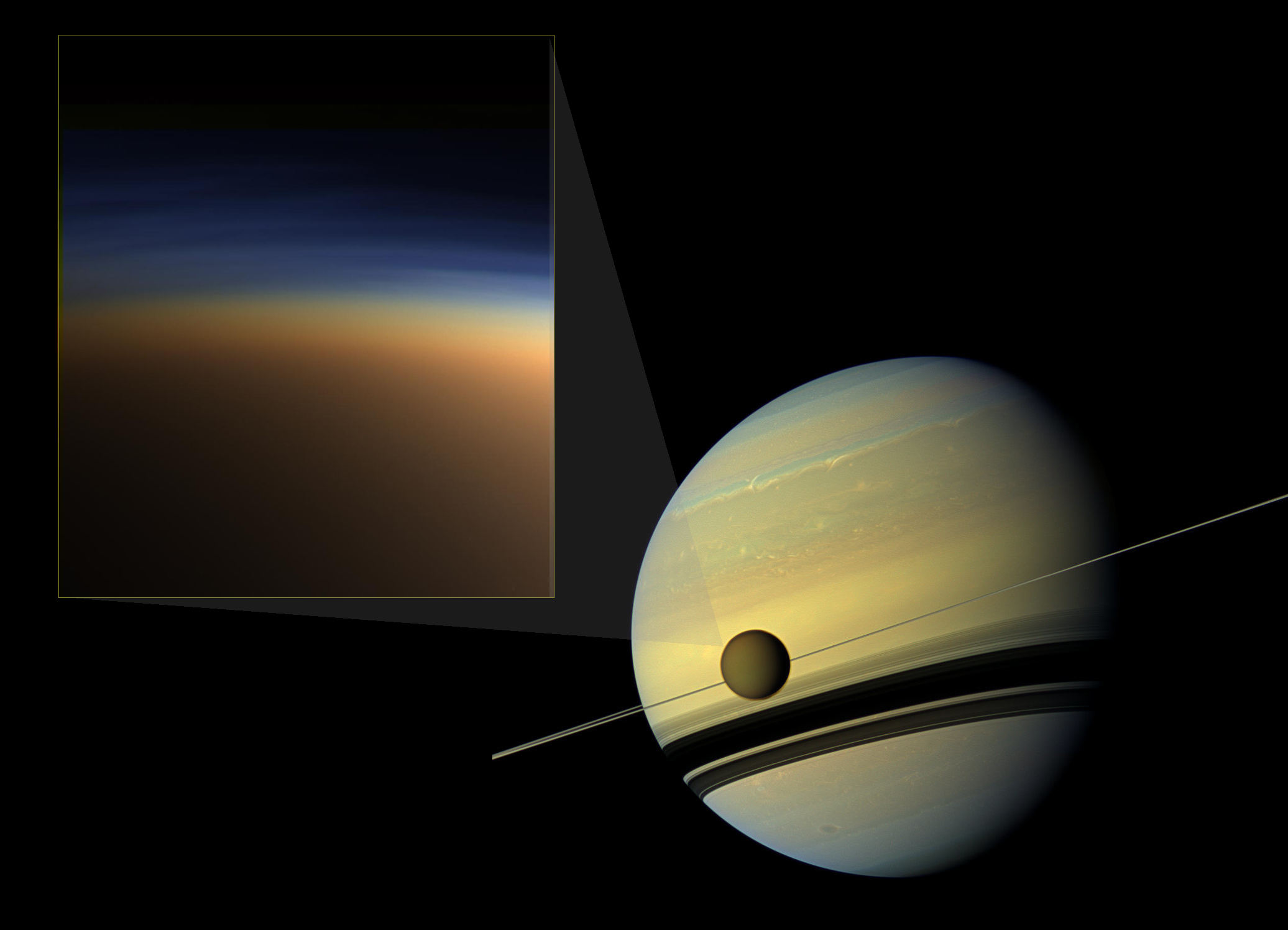 Image - The atmospheric haze of Titan, Saturn’s largest moon (pictured here along Saturn’s midsection), is captured in this natural-color image (box at left). A new study, which involved X-ray experiments at Berkeley Lab’s Advanced Light Source, has revealed new clues that may help to unravel the formation of this haze. (Credits: NASA Jet Propulsion Laboratory, Space Science Institute, Caltech)
