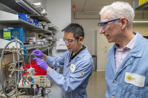 Berkeley Lab and Joint Center for Artificial Photosynthesis researchers Yanwei Lum (left) and Joel Ager have discovered that copper has potential as a catalyst for turning carbon dioxide into sustainable chemicals and fuels without any wasteful byproducts, creating a green alternative to present-day chemical manufacturing. 
