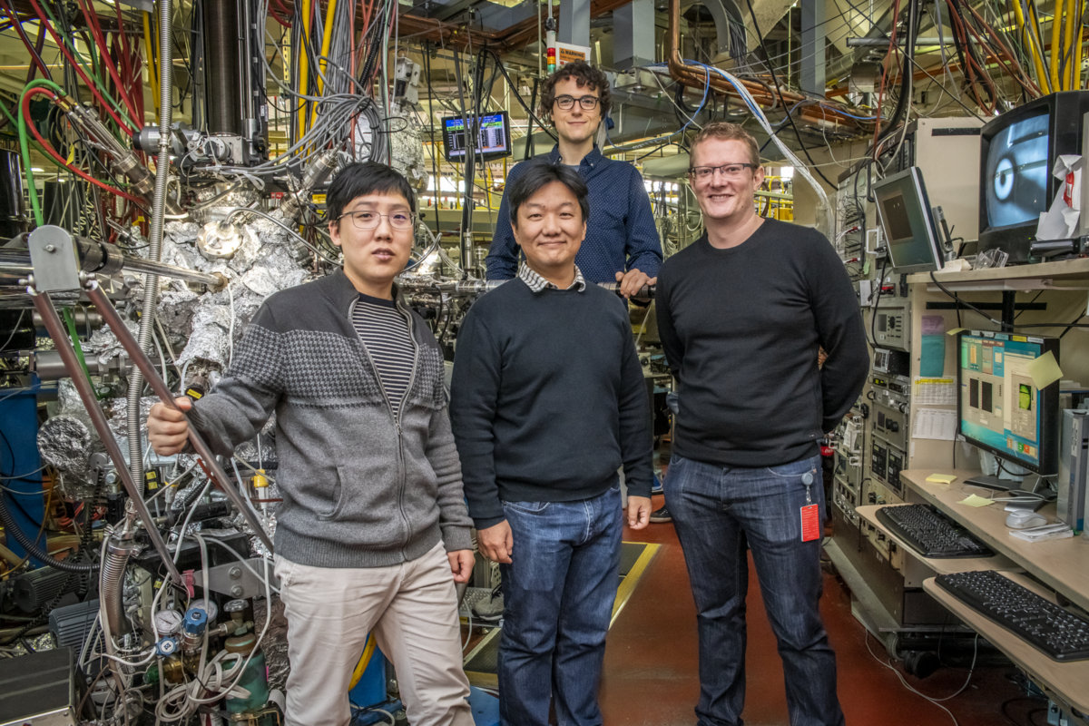 Photo - From left to right: Shujie Tang, a postdoctoral researcher at Berkeley Lab’s Advanced Light Source (ALS); Sung-Kwan Mo, an ALS staff scientist; and James Collins and Mark Edmonds, researchers at Monash University, gather during an experiment at ALS Beamline 10.0.1 in November. (Credit: Marilyn Chung/Berkeley Lab)