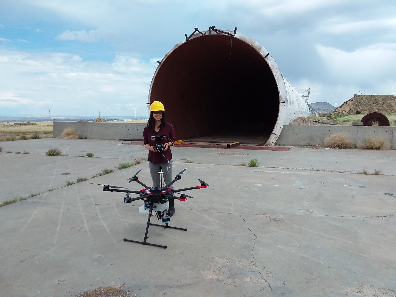 Photo - Erika Suzuki pilots a drone equipped with a LAMP radiation detection and mapping system in a 2019 technology demonstration. (Courtesy of Erika Suzuki)