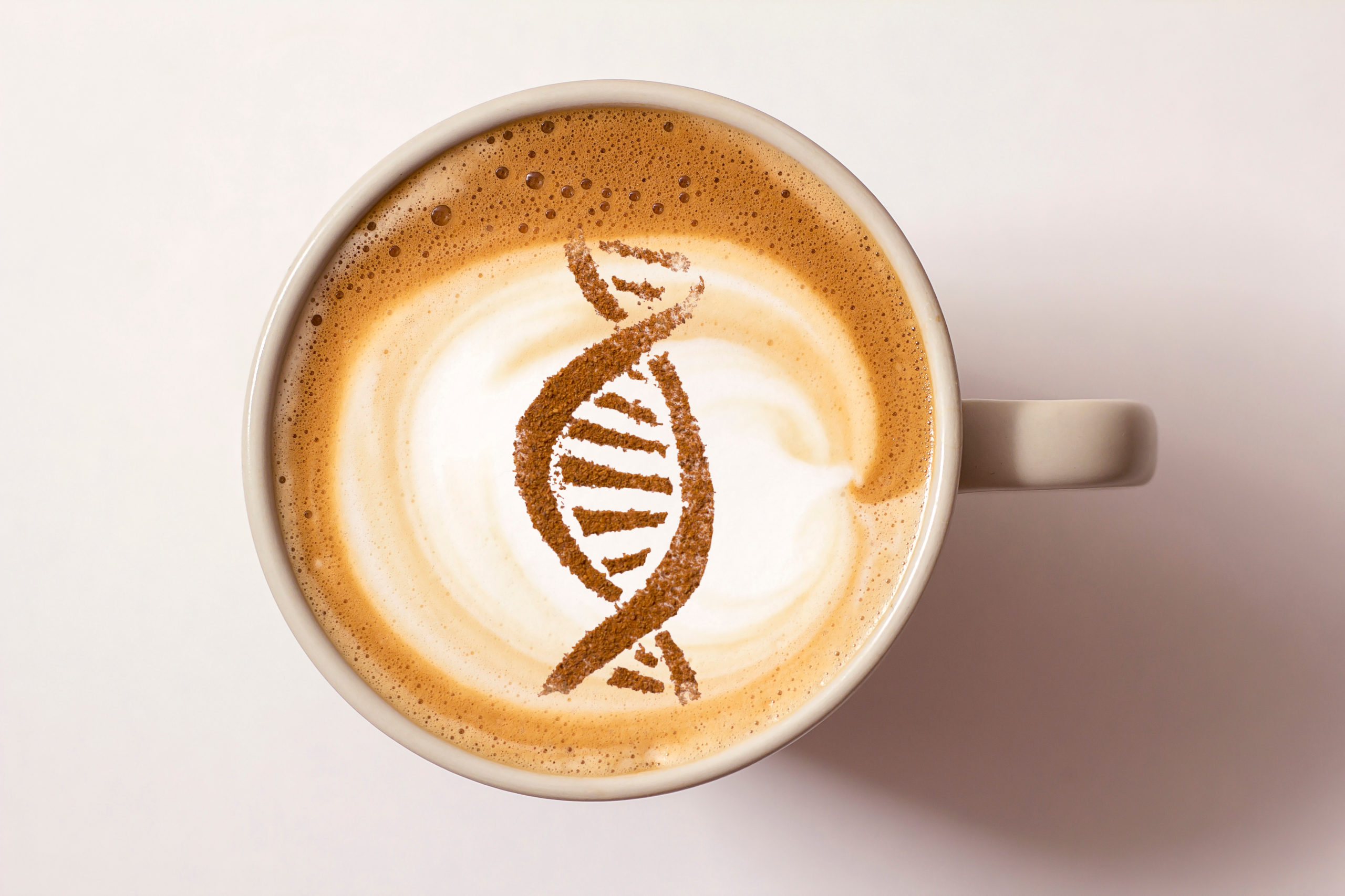 A cup of coffee with a DNA symbol